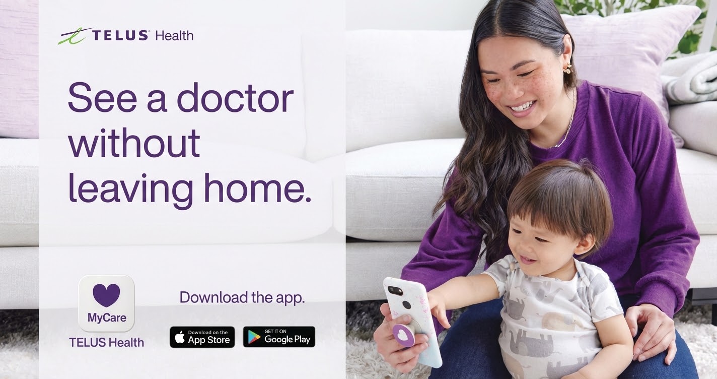 &lsquo;See a doctor without leaving home.&rsquo; TELUS Health MyCare lifestyle print , mother and toddler on a phone at home.