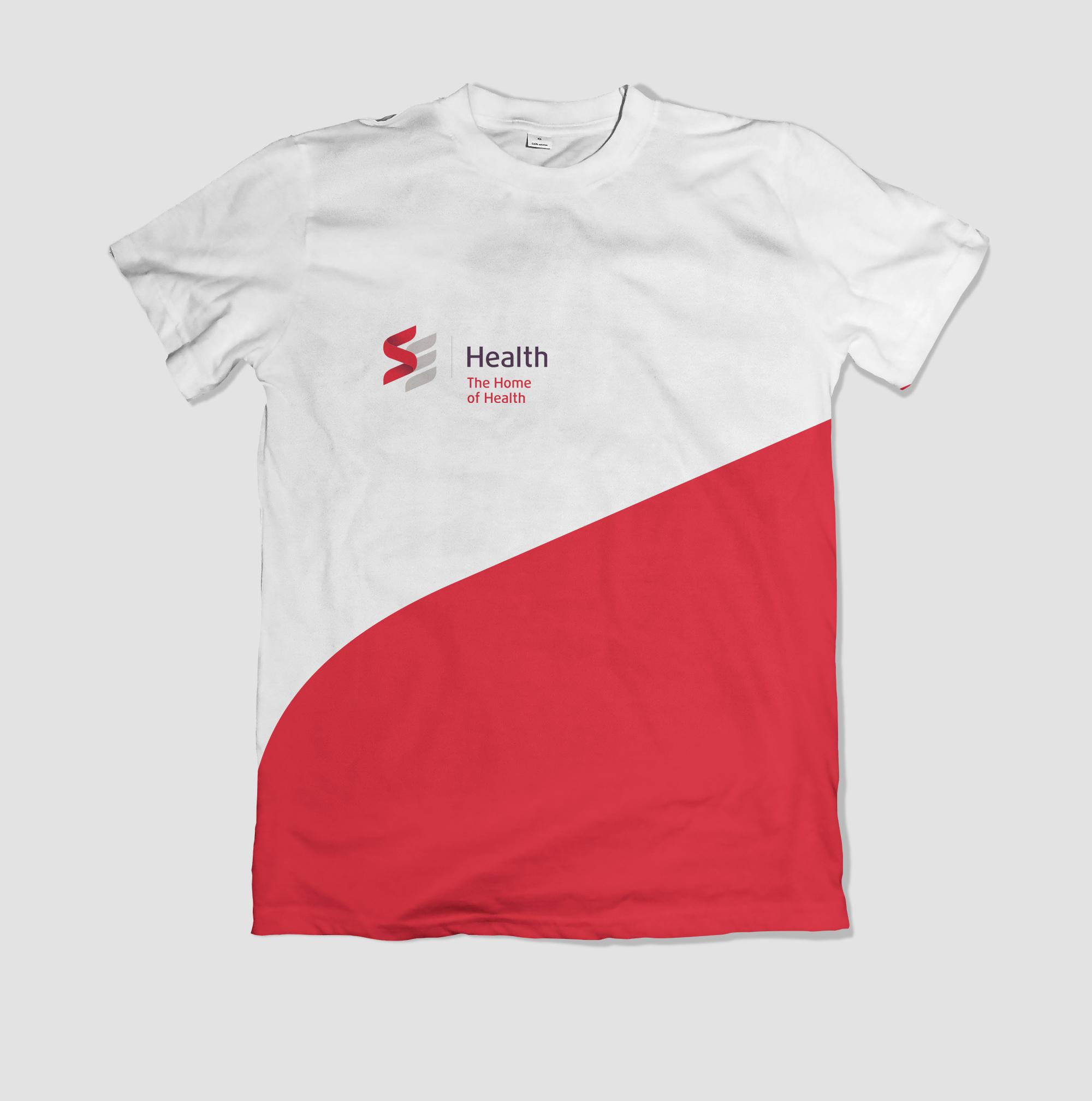 SE Health t-shirt with red swoosh and Home of Health lockup , team apparel.