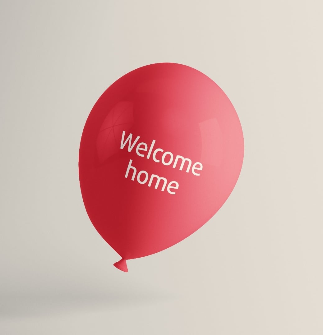 Red ‘Welcome home’ balloon , SE Health brand-system object.
